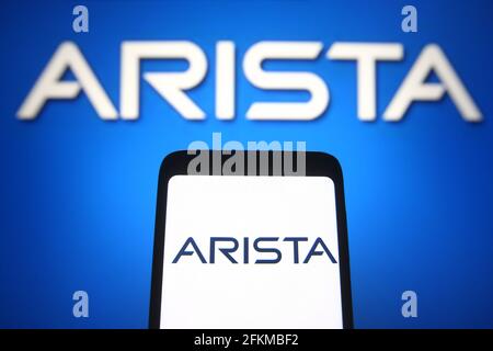 Ukraine. 02nd May, 2021. In this photo illustration an Arista Networks logo of an US computer networking company is seen on a smartphone and a pc screen. Credit: SOPA Images Limited/Alamy Live News Stock Photo