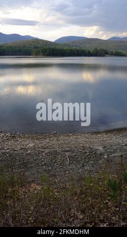 Half empty drinking water reservoir, Cooper Lake, Lake Hill, NY, USA Stock Photo