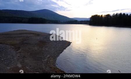 Half empty drinking water reservoir, Cooper Lake, Lake Hill, NY, USA Stock Photo