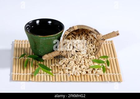 Cup of Diptam Root Bark Tea (Dictamni Cortex), Bai Xian Pi, Diptam Root Bark Tea, Diptam Root Bark Tea Stock Photo