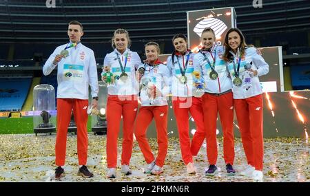 Chorzow, Poland. 2nd May, 2021. Team of Poland pose on the podium at the World Athletics Relays Silesia21 at Silesian Stadium in Chorzow, Poland, May 2, 2021. Credit: Rafal Rusek/Xinhua/Alamy Live News Stock Photo