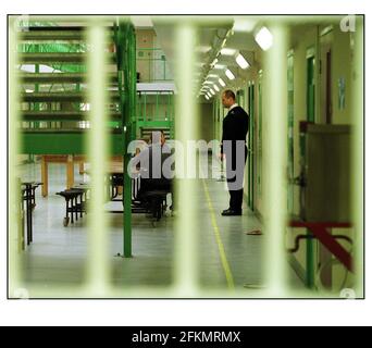 Stoke Heath Young Offenders Institution/ShropshireA prison officer with some of the young inmates  pic David Sandison. 21/2/2001 Stock Photo