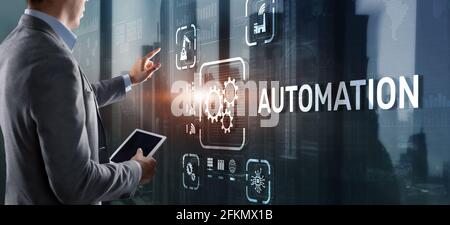 Man clicks on 3d virtual screen Automation. Optimization of business and production processes. Stock Photo