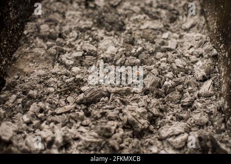 a charcoal and ash in the grill close-up background Stock Photo