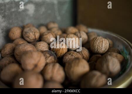 lot of walnuts are in the bucket Stock Photo
