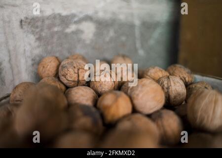 lot of walnuts are in the bucket Stock Photo