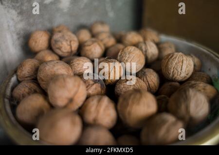 lot of walnuts are in the bucket Stock Photo