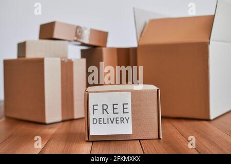 Small cardboard box with free delivery label Stock Photo