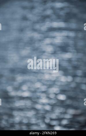 Abstract blurred background of sunlight reflection on sea water surface Stock Photo
