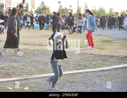 Beijing, China. 2nd May, 2021. People enjoy themselves at the Strawberry Music Festival in Beijing, capital of China, May 2, 2021. The 2021 Strawberry Music Festival is held at Beijing Expo Park from May 2 to May 4. Credit: Xiao Xiao/Xinhua/Alamy Live News Stock Photo