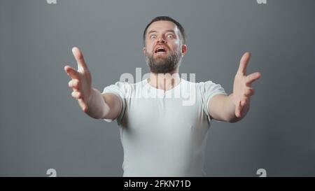 Photo of surprised young man with beard Stock Photo
