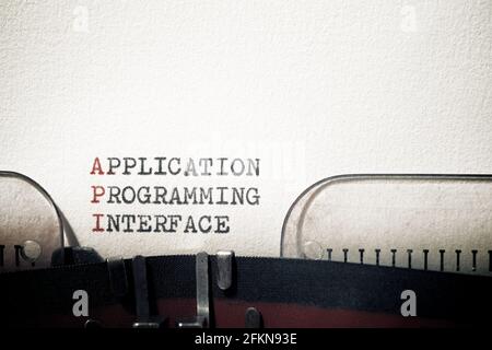 Application programming interface phrase written with a typewriter. Stock Photo