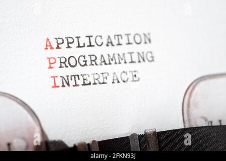 Application programming interface phrase written with a typewriter. Stock Photo