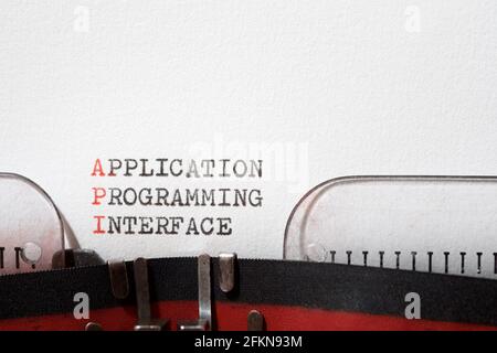 Application programming interface phrase written with a typewriter. Stock Photo