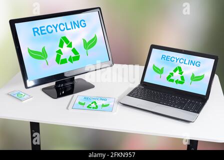 Recycling concept shown on different information technology devices Stock Photo