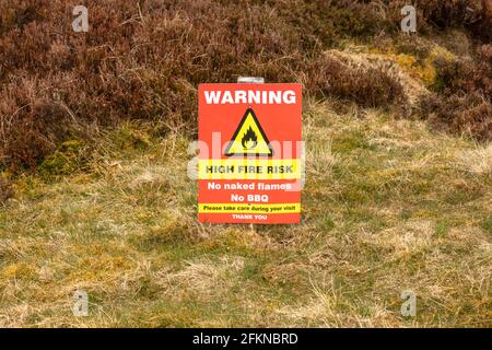 Warning sign about the high risk of fires on tinder dry Grouse Moors in the Yorkshire Dales, UK. Fires cause death and destruction to wildlife includi Stock Photo