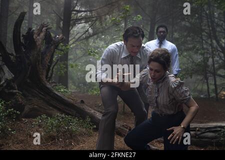 VERA FARMIGA, PATRICK WILSON and ARTHUR KEITH BOLDEN in CONJURING, THE: THE DEVIL MADE ME DO IT (2021), directed by MICHAEL CHAVES. Credit: NEW LINE CINEMA / Album Stock Photo