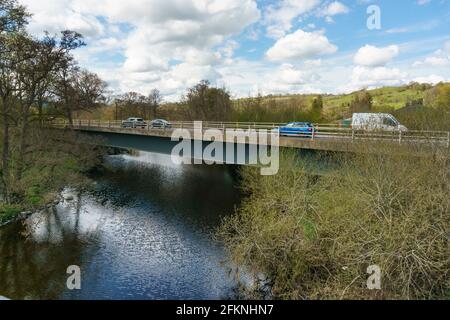 The modern Pont Melin Rhug bridge over the River Alwen on the A5 road outside Corwen between Betws y Coed and Llangollen in North East Wales Stock Photo