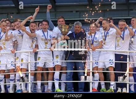 KYIV, UKRAINE - APRIL 25, 2021: FC Dynamo Kyiv players celebrate after winning the Ukrainian Premier League 2020-21 at NSC Olimpiyskiy stadium in Kyiv, Ukraine. Dynamo won 5-0 against Inhulets Stock Photo