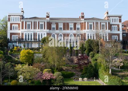 Sandown Terrace Italianate grade ii listed building on banks of the River Dee with private residential garden in bloom. Chester, Cheshire, UK Stock Photo