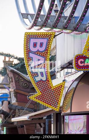 Yorkshire, UK – 10 Aug 2017 : close up on a colourful illuminated sign for a bar at Bridlington Stock Photo