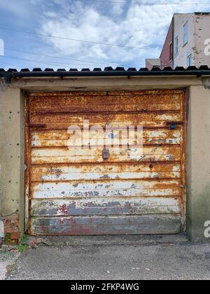 Rusted metal garage door Stock Photo
