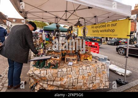 A stall selling material upcycled as lamps, Alresford Brocante, local flea market, Alresford, Hampshire, UK Stock Photo