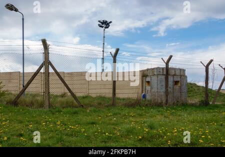 view of a British Army soldier training fortified building pill box Stock Photo