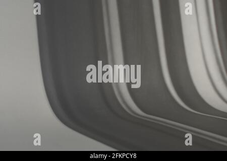 Striped Shadow background. Grey paper texture. Abstract minimal composition. Stock Photo