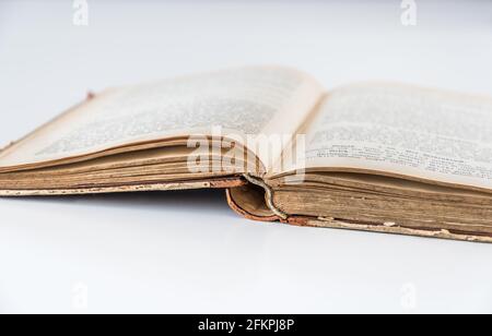Old antique open book on white background, isolated Stock Photo