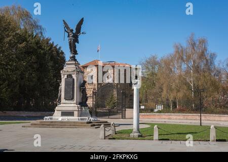 Colchester War Memorial, view of the war memorial sited in Cowdray Crescent at the entrance to Colchester Castle Park, Essex, England, UK Stock Photo