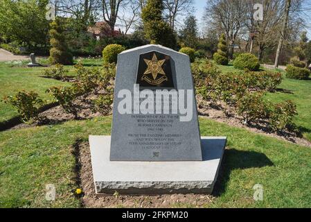 Burma Star Association UK, view of a stone monument honouring those who served in the Burma Campaign in World War II, Colchester Castle Park, Essex UK Stock Photo