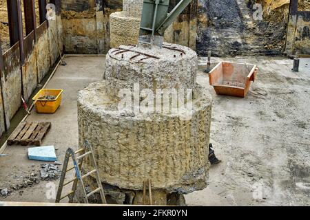 High voltage pylon, maintenance, foundation work, reinforcement Stock Photo