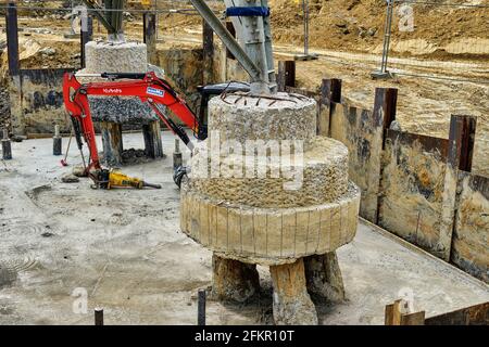 High voltage pylon, maintenance, foundation work, reinforcement Stock Photo