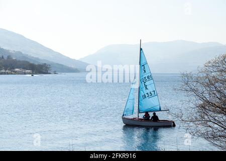 A small sailboat on Loch Earn, St fillans, Perthshire, Scotland Stock Photo