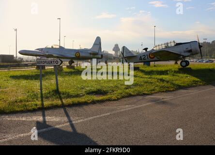 Retired deteriorating Spanish Air Force Lockheed T-33 jet trainer and  North American AT-6 trainer on permanent display Santander Airport Spain Stock Photo
