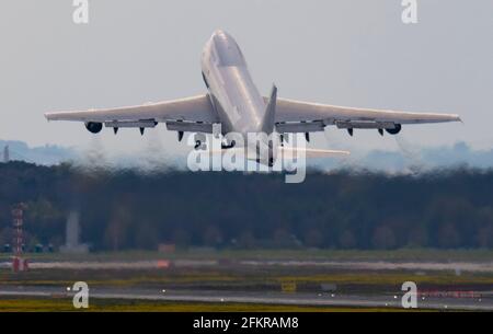 03 May 2021, Hessen, Frankfurt/Main: A cargo plane takes off at Frankfurt Airport. The aviation industry is particularly hard hit by the effects of the global Corona pandemic. Photo: Boris Roessler/dpa Stock Photo