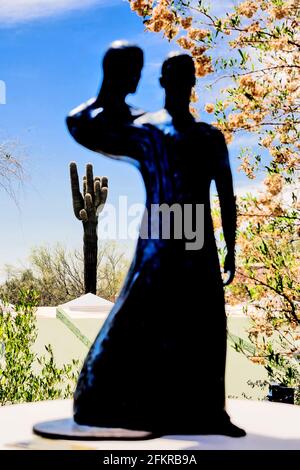 Statue and cactus tree, Taliesin West  architect Frank Lloyd Wright's winter home and school in the desert, Scottsdale, Arizona, USA Stock Photo