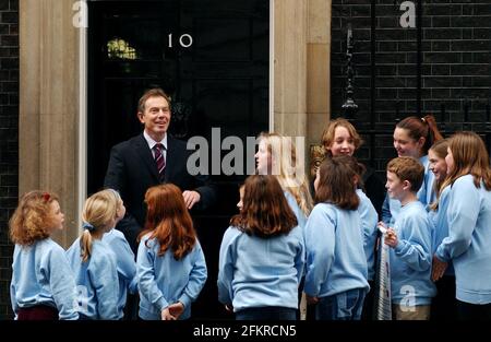 Prime Minister Tony Blair greets children representing the Children's Farm Animal Welfare Charter with the message We eat them (farm animals).We owe them a happy life28 November 2002 photo Andy Paradise Stock Photo