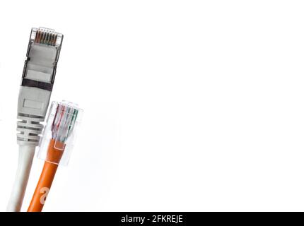 two straight grey and orange lan cable with plug isolated on white background Stock Photo