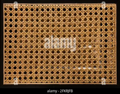Hexagonal weaving from rattan texture Stock Photo