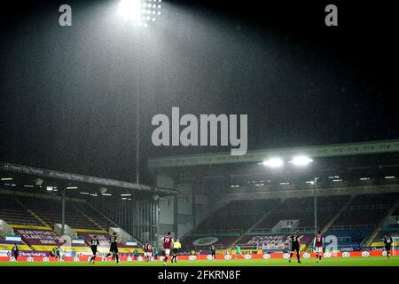 Heavy rain falls during the Premier League match at Tuff Moor, Burnley. Issue date: Monday May 3, 2021.