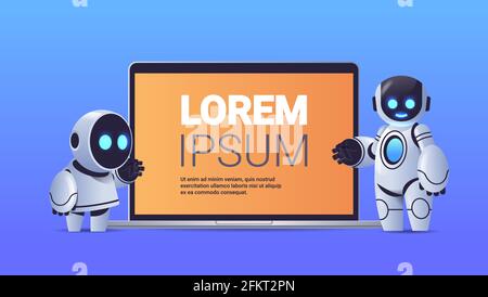 modern robots couple standing near laptop with blank screen robotic character artificial intelligence technology Stock Vector