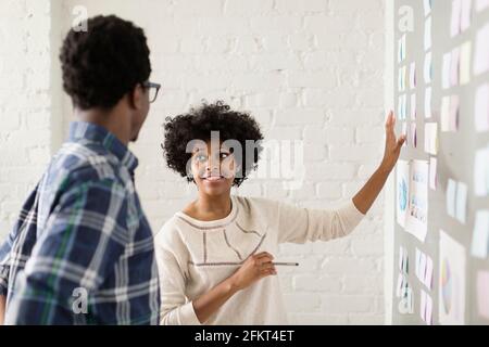 Two colleagues working in creative studio Stock Photo