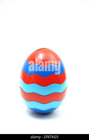 Colorful plastic egg isolated on white background Stock Photo