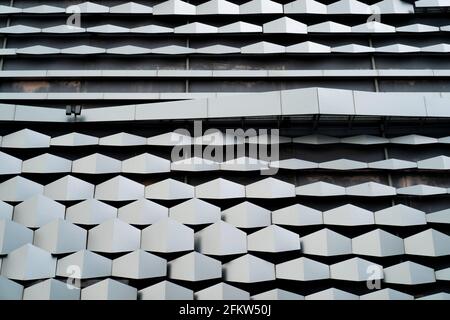 modern Aluminium composite material architecture gray color and Hexagon shape popup texture on exterior facade building. Stock Photo