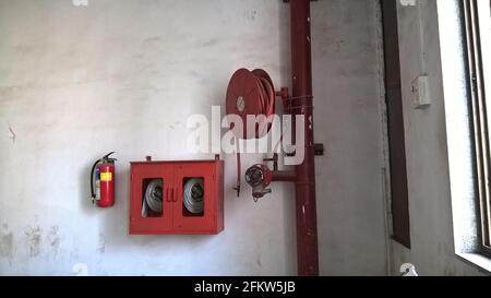 fire extinguisher pipe hose reel systems Stock Photo