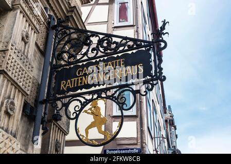 Hamelin, Germany - August 20, 2019: Drawing of the Pied Piper on a street in Hamelin, Lower Saxony, Germany Stock Photo