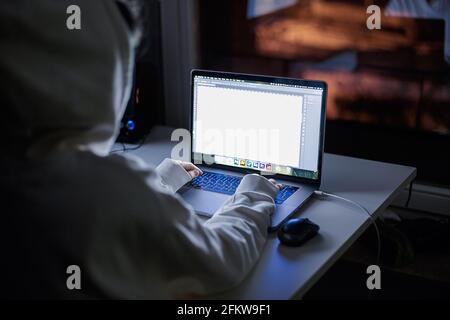 A female work at night home alone. Close-up Stock Photo