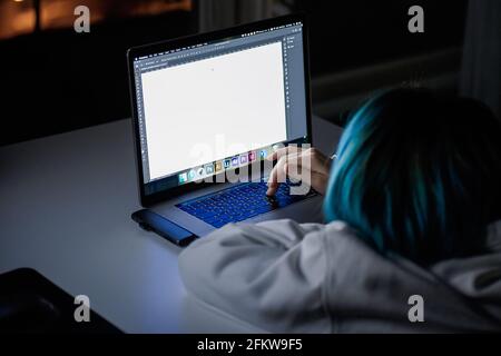 A female work at night home alone. Close-up Stock Photo